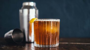 a glass of rhymes with orange cocktail